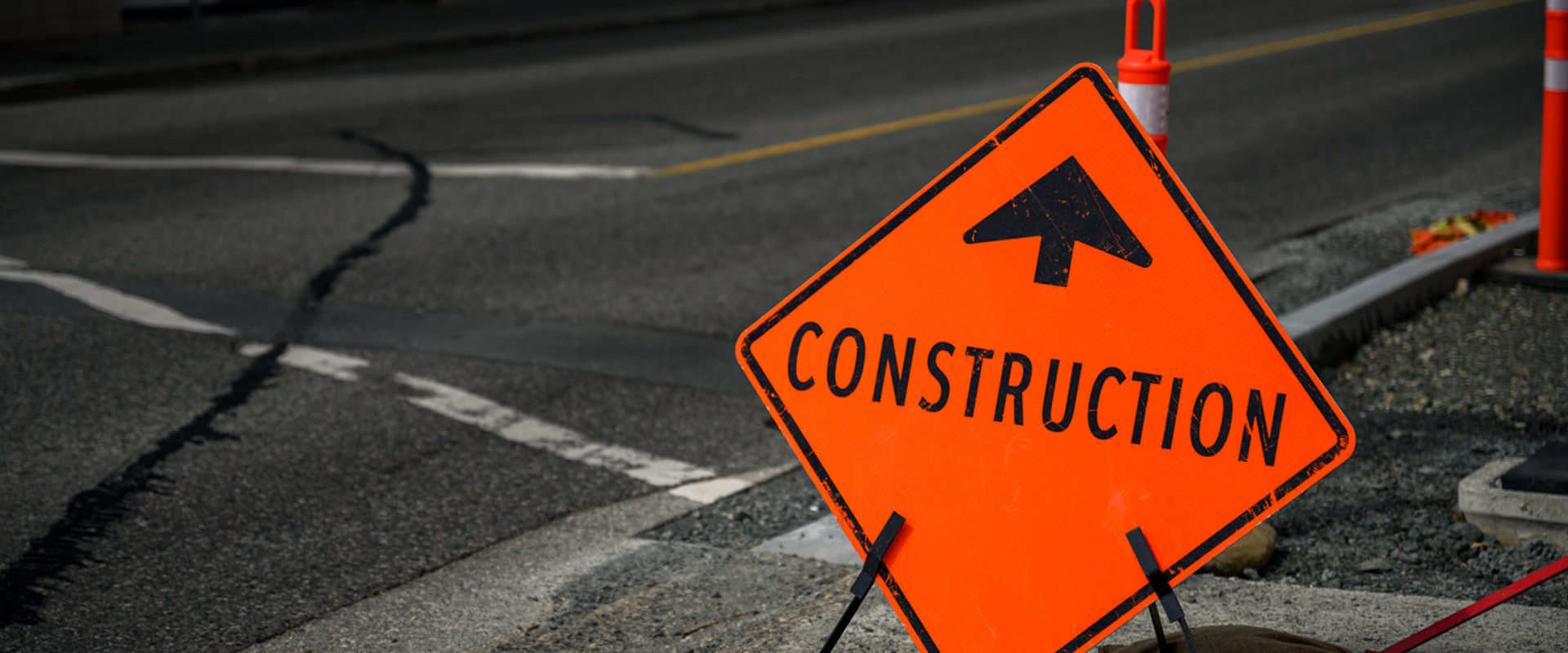 Why are construction signs important?